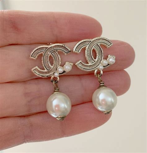 chanel earrings dangle pearl|authentic Chanel pearl earrings.